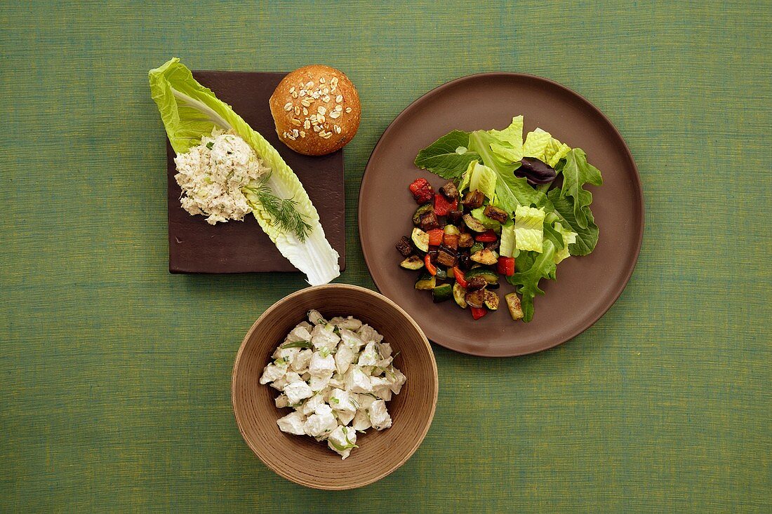 Lunch Assortment: Tuna Salad with Dill on Romaine with Oat Roll, Tarragon Chicken Salad and Grilled Vegetable Salad