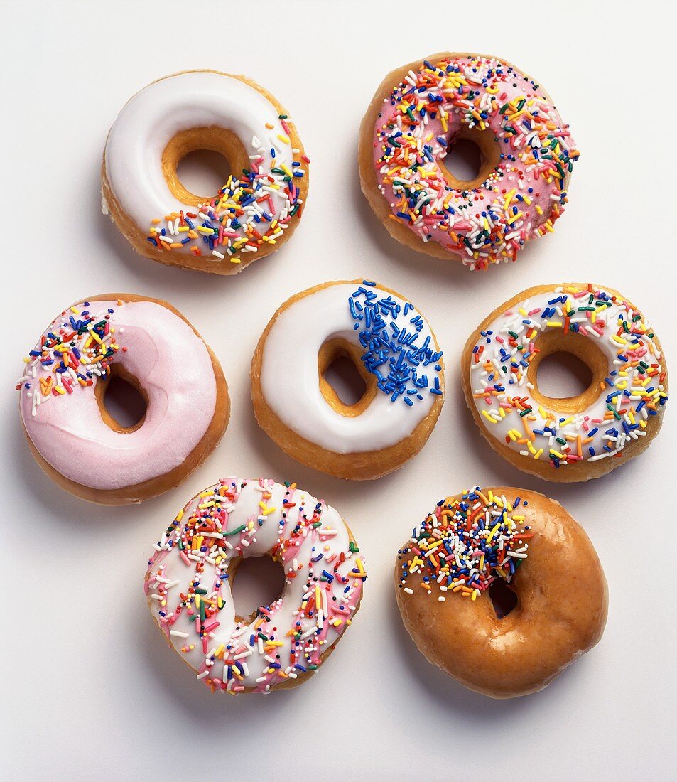 Assorted Frosted and Glazed Donuts with Rainbow Sprinkles