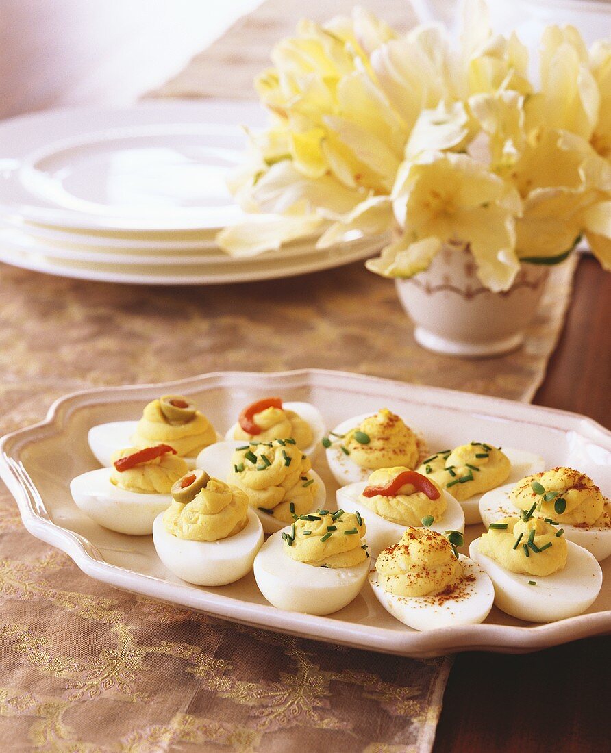 Deviled eggs on a white platter
