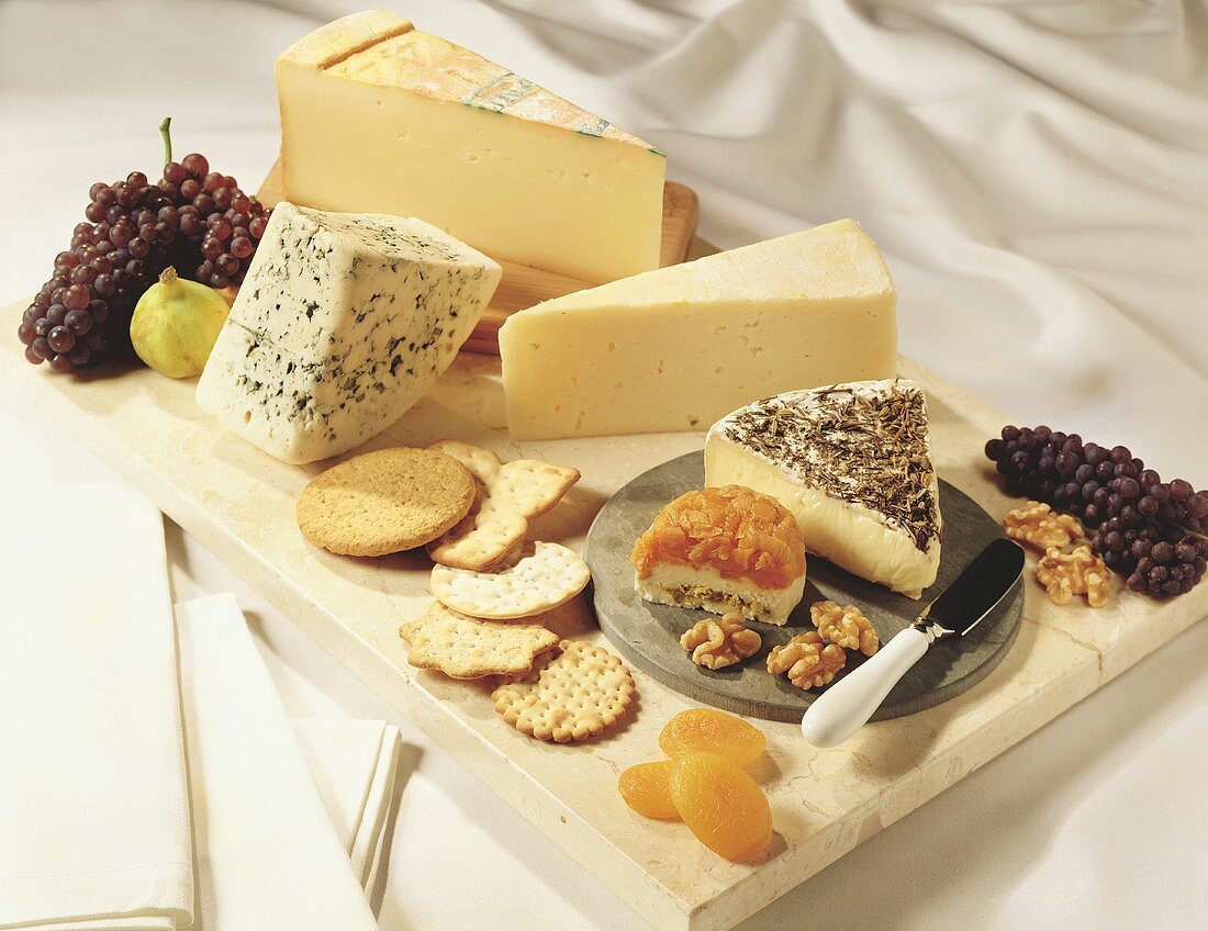 Cheese tray with apricots and walnuts