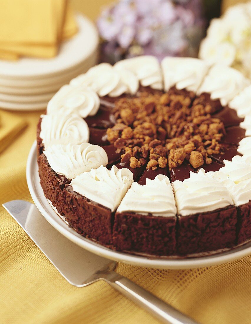 Chocolate torte with ganache and whipped cream topping