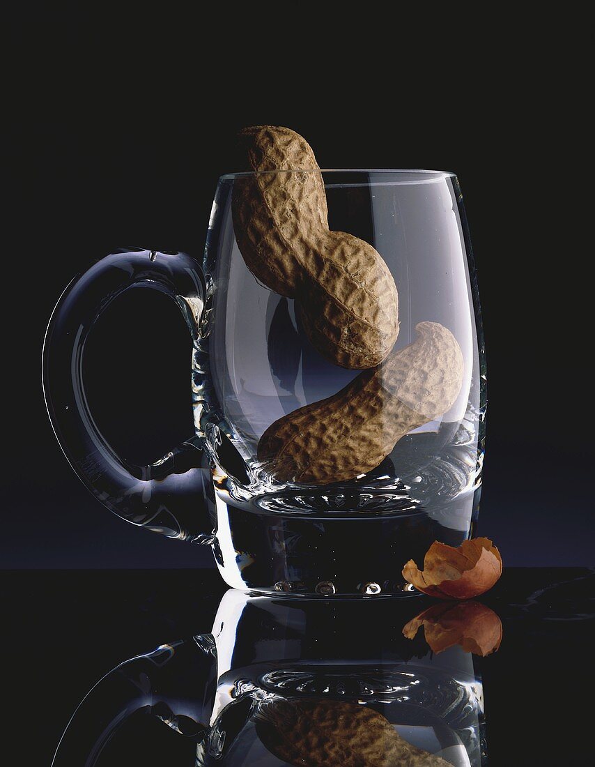 Two peanuts in a beer mug