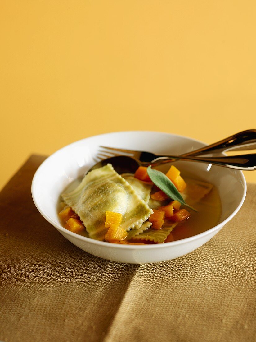 Homemade Ravioli in Broth with Carrots and Sage