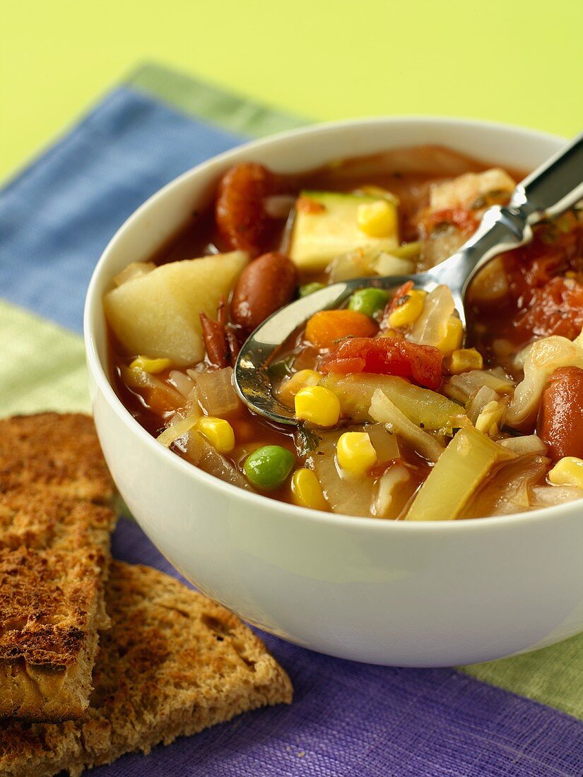 A Bowl of Minestrone with Toasted Bread