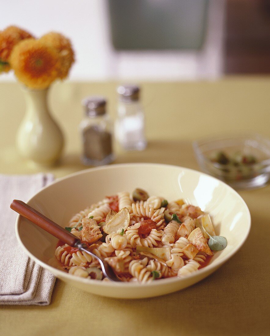 Fusilli with artichokes, tomatoes and olives