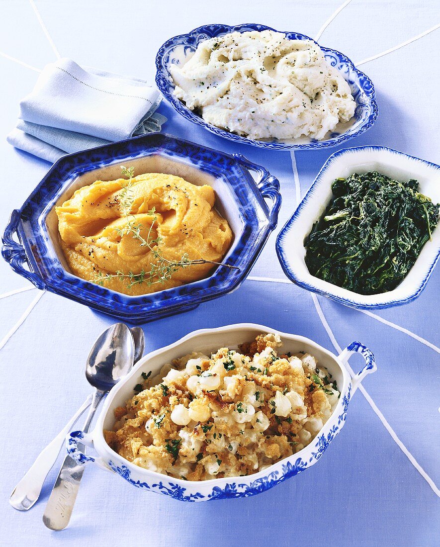 Four Assorted Side Dishes; Mashed Potatoes, Sweet Potatoes, Spinach and Pearl Onions