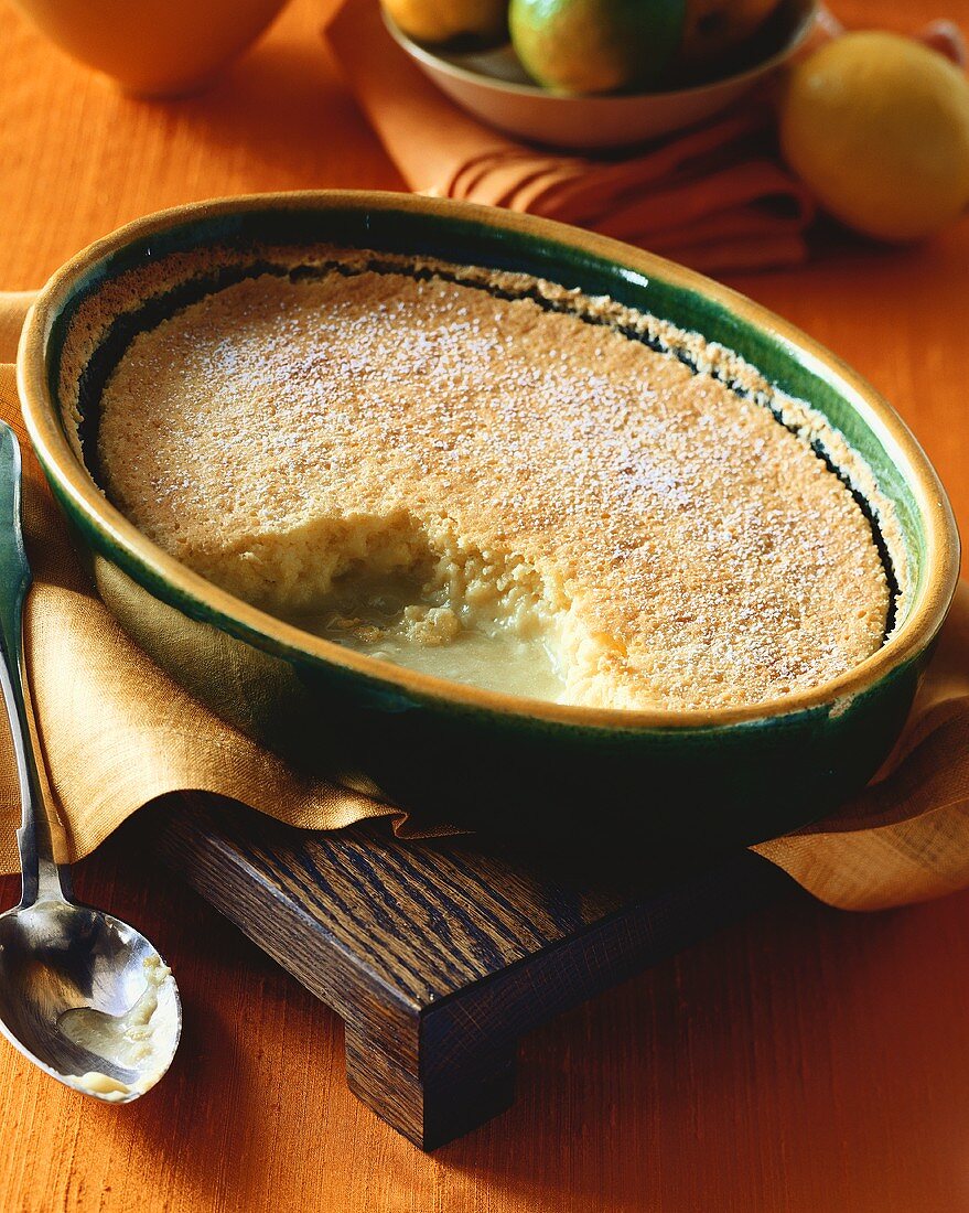 Lemon Pudding in Baking Dish with Scoop Removed
