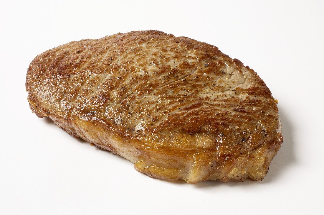 A Cooked Steak on White Background