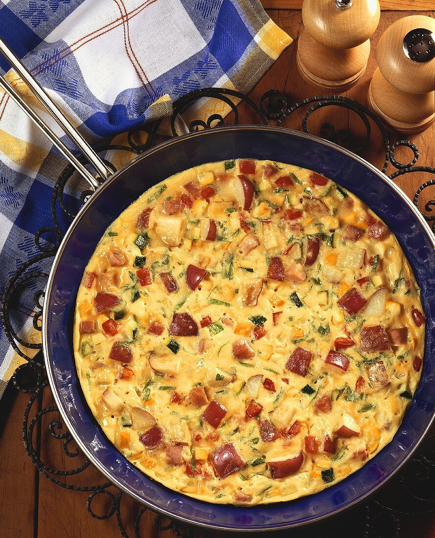 Overhead of Vegetable and Ham Frittata in Skillet
