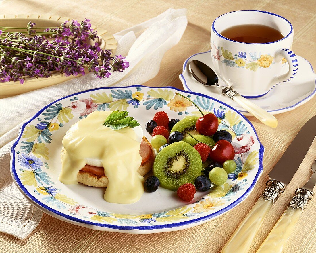 Eggs Benedict with Fruit Salad; Cup of Tea