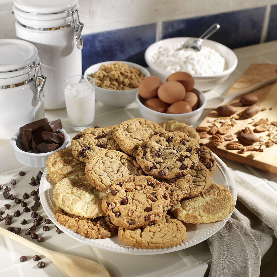 Assorted Homemade Cookies on a Platter with Baking Ingredients