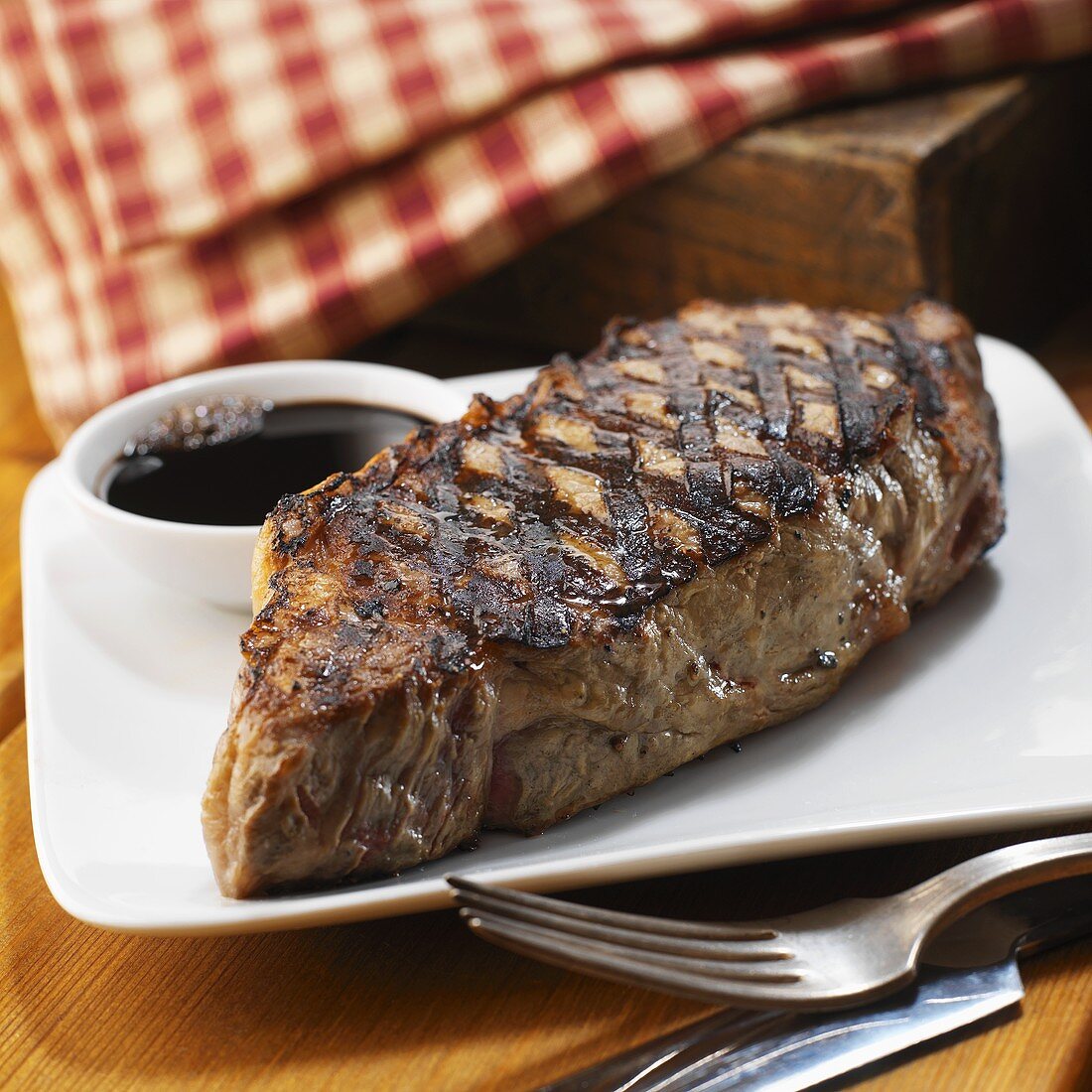 Grilled steak with sauce