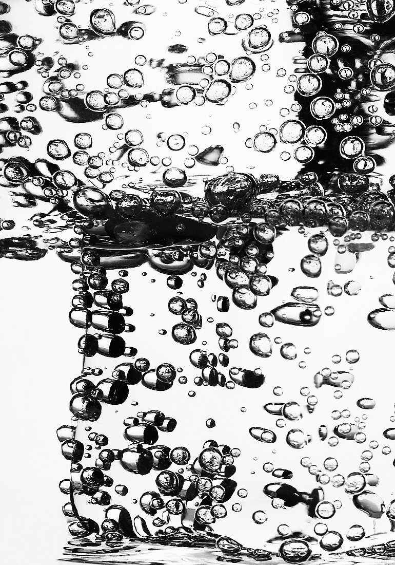 Close Up of Tonic Water Bubbles on Ice Cubes