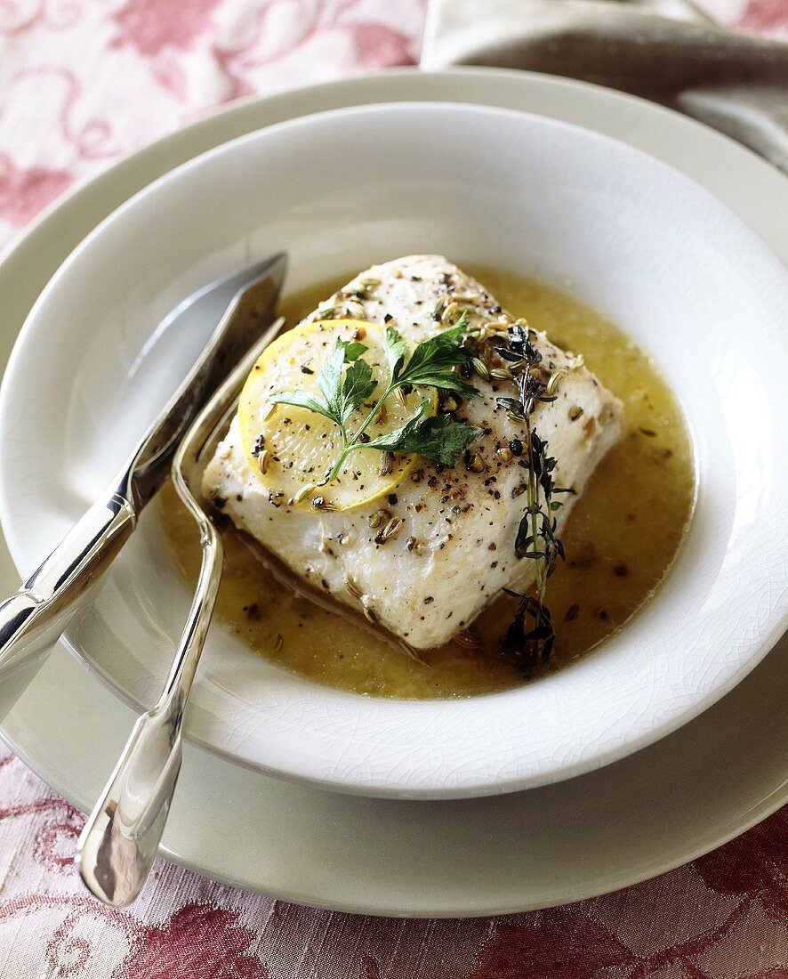 Poached Halibut Fillet in Lemon Herb Broth