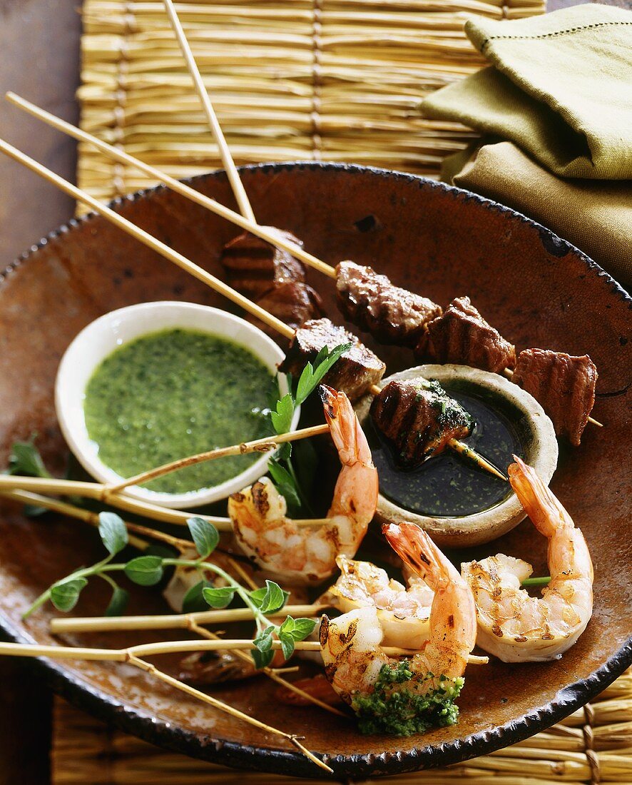 Grilled shrimp and beef kebabs with dips