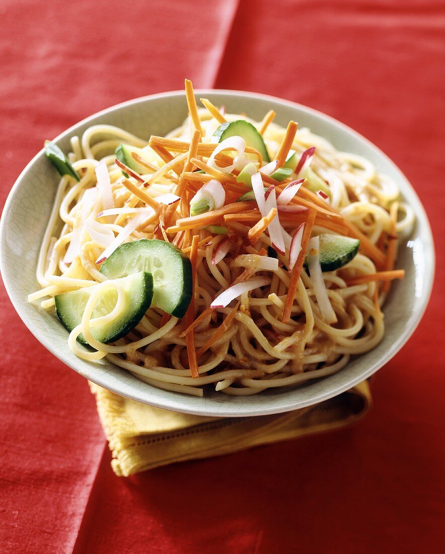 Pasta salad with vegetables and peanut sauce