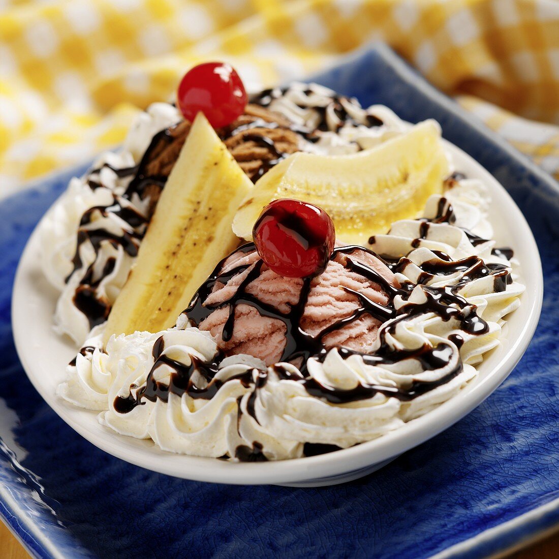 A Banana Split with Strawberry and Chocolate Ice Cream