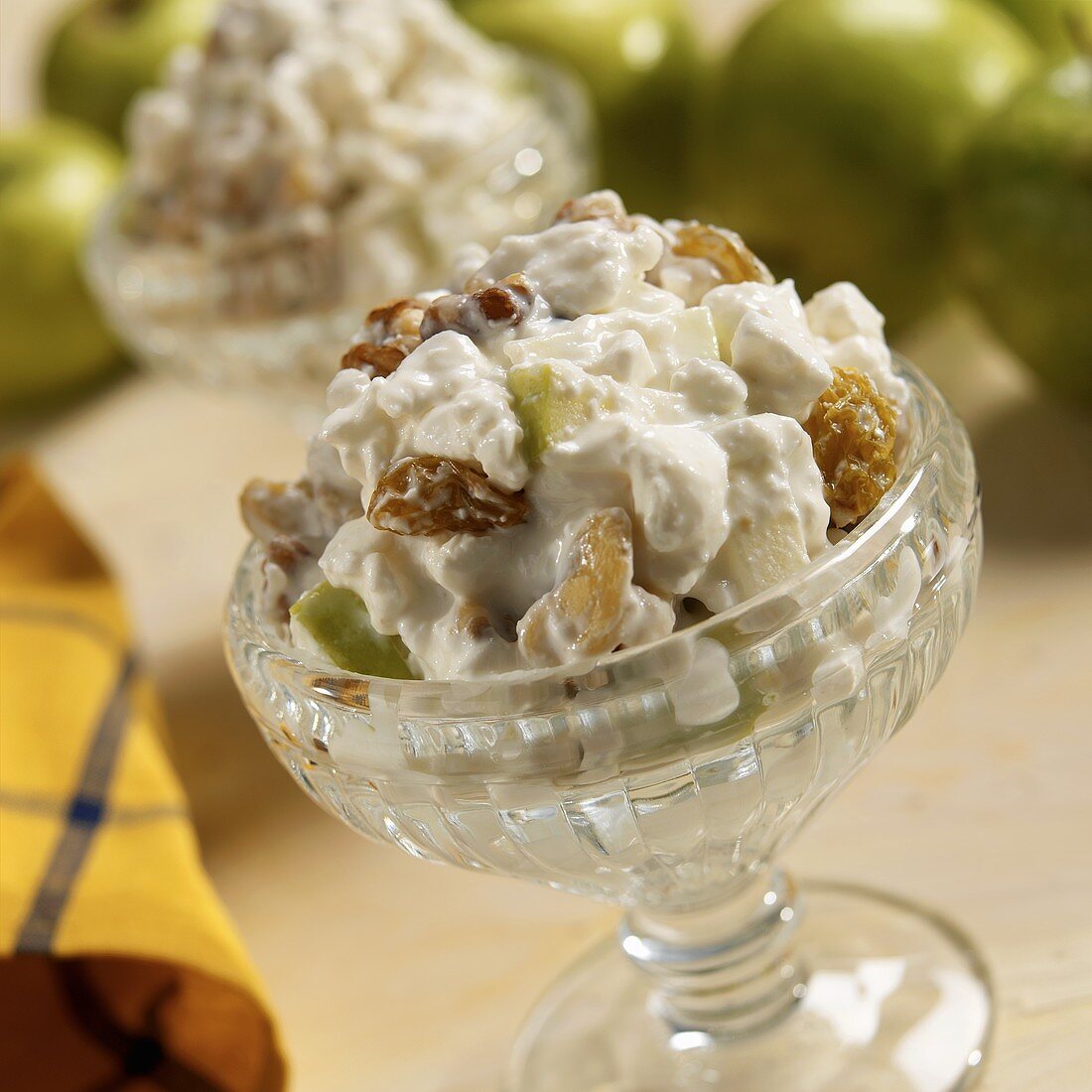 Cottage Cheese with Golden Raisins, Apples and Walnuts in Small Bowls