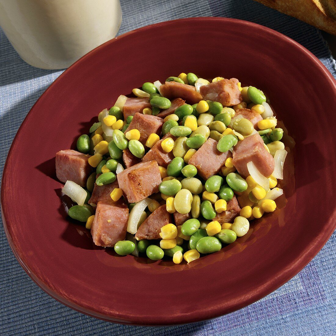 Skillet Casserole with Ham, Edamame, Lima Beans and Corn in a Bowl