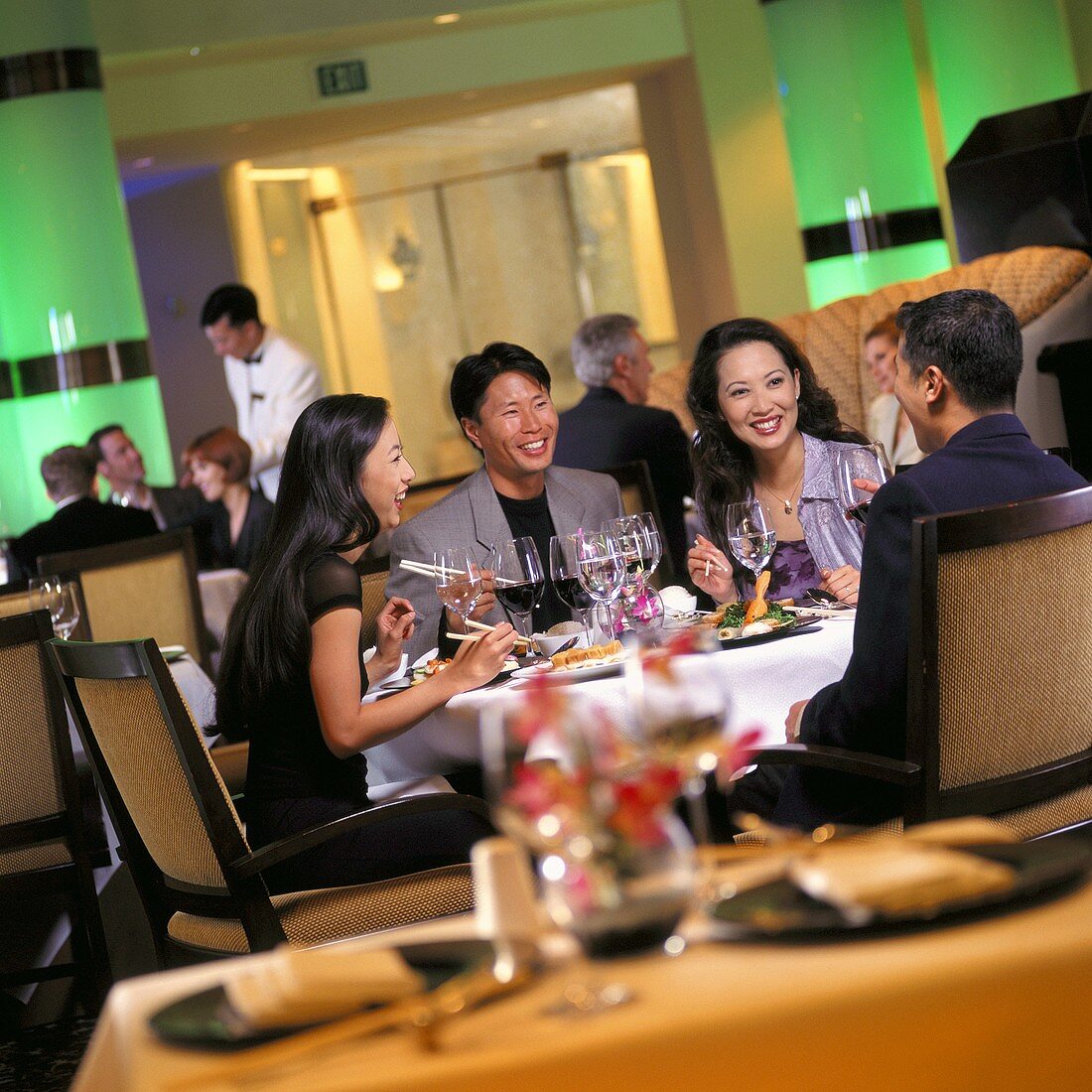 Two Couples Dining in Restaurant