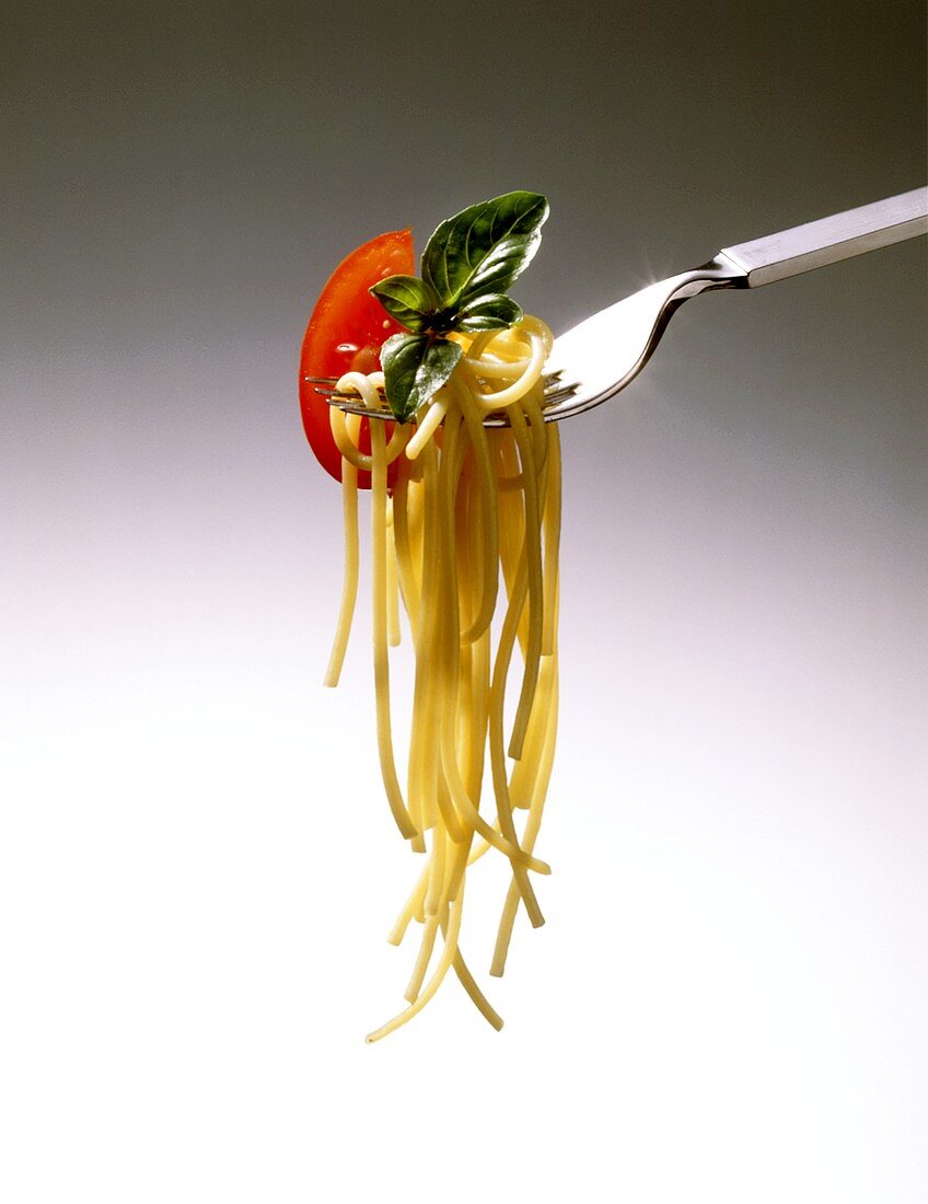 Spaghetti on a Fork with Tomato and Basil