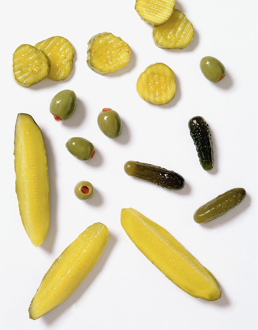 Assorted Pickles and Olives on White