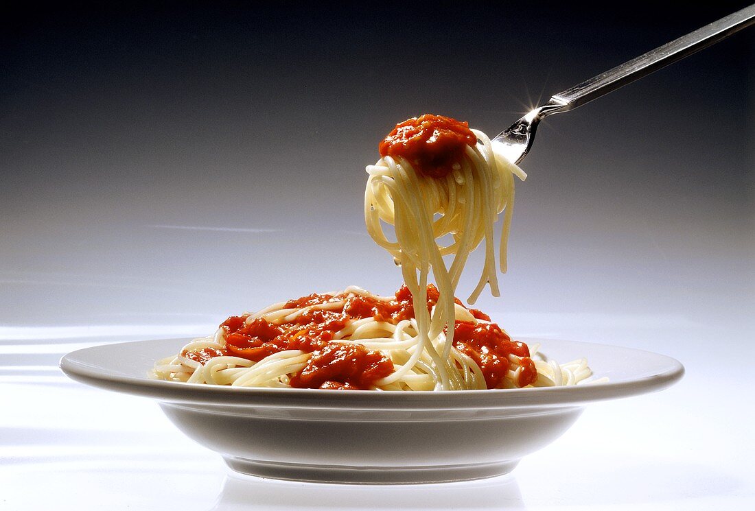 Rolled Spaghetti on Fork inTomato Sauce