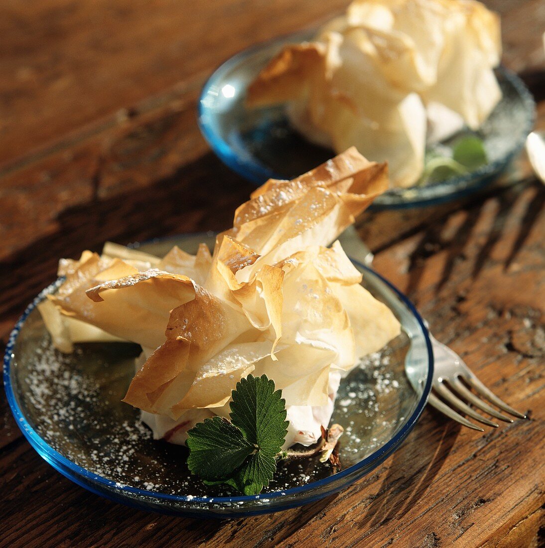 Sweet filo pastries with icing sugar