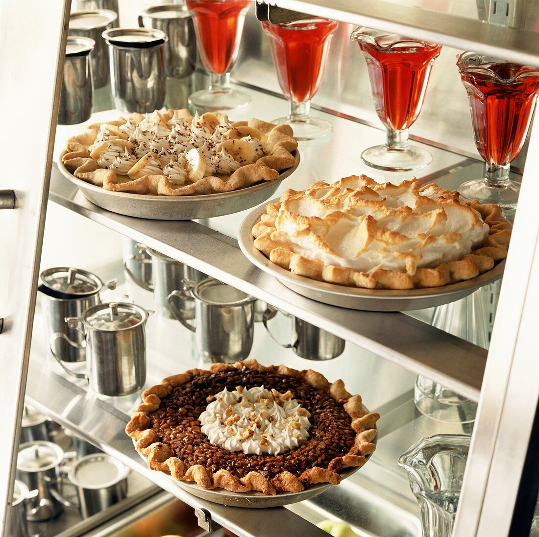 Three different pies in display case (USA)