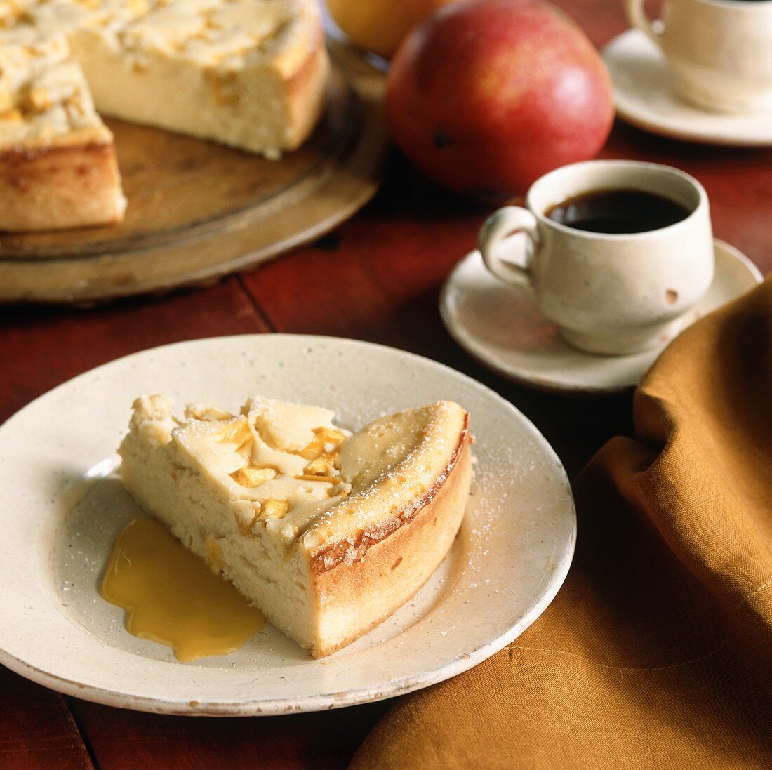 A piece of apple cheesecake and coffee (USA)