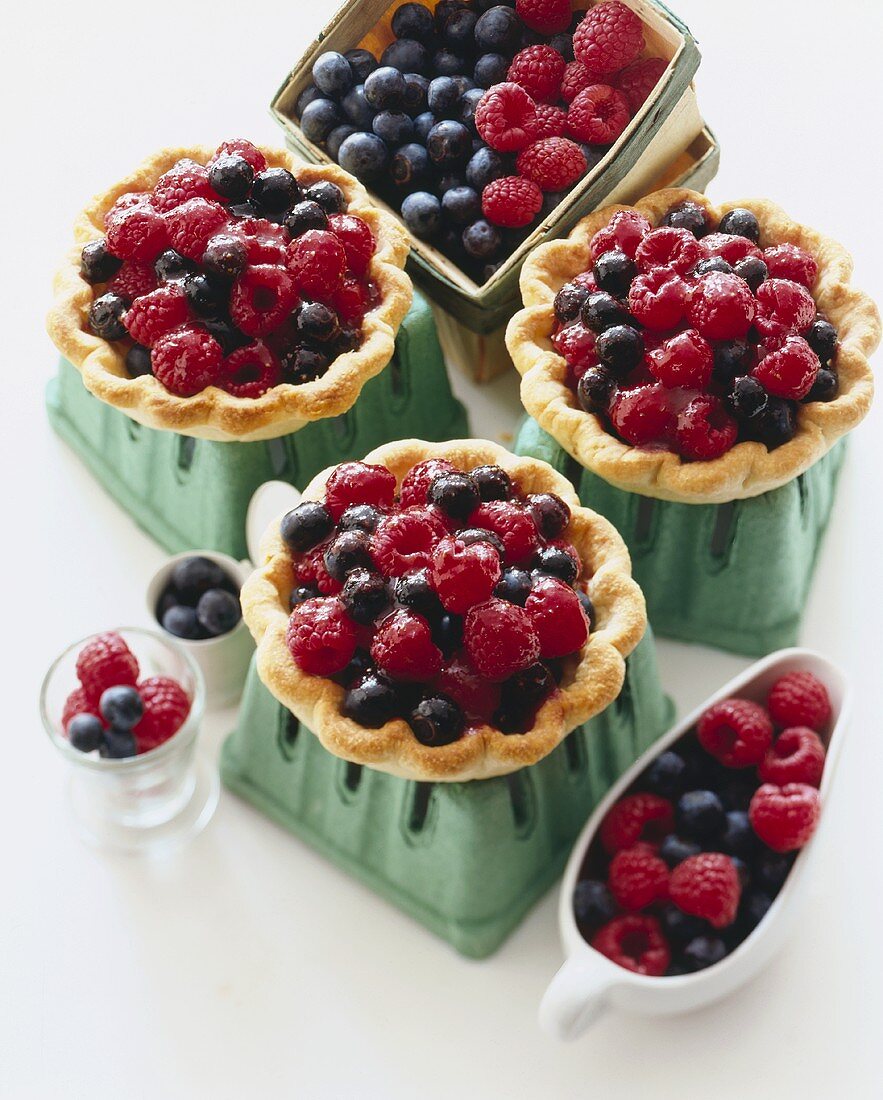 Mini Mixed Berry Tarts on Cardboard Berry Containers, Fresh Berries