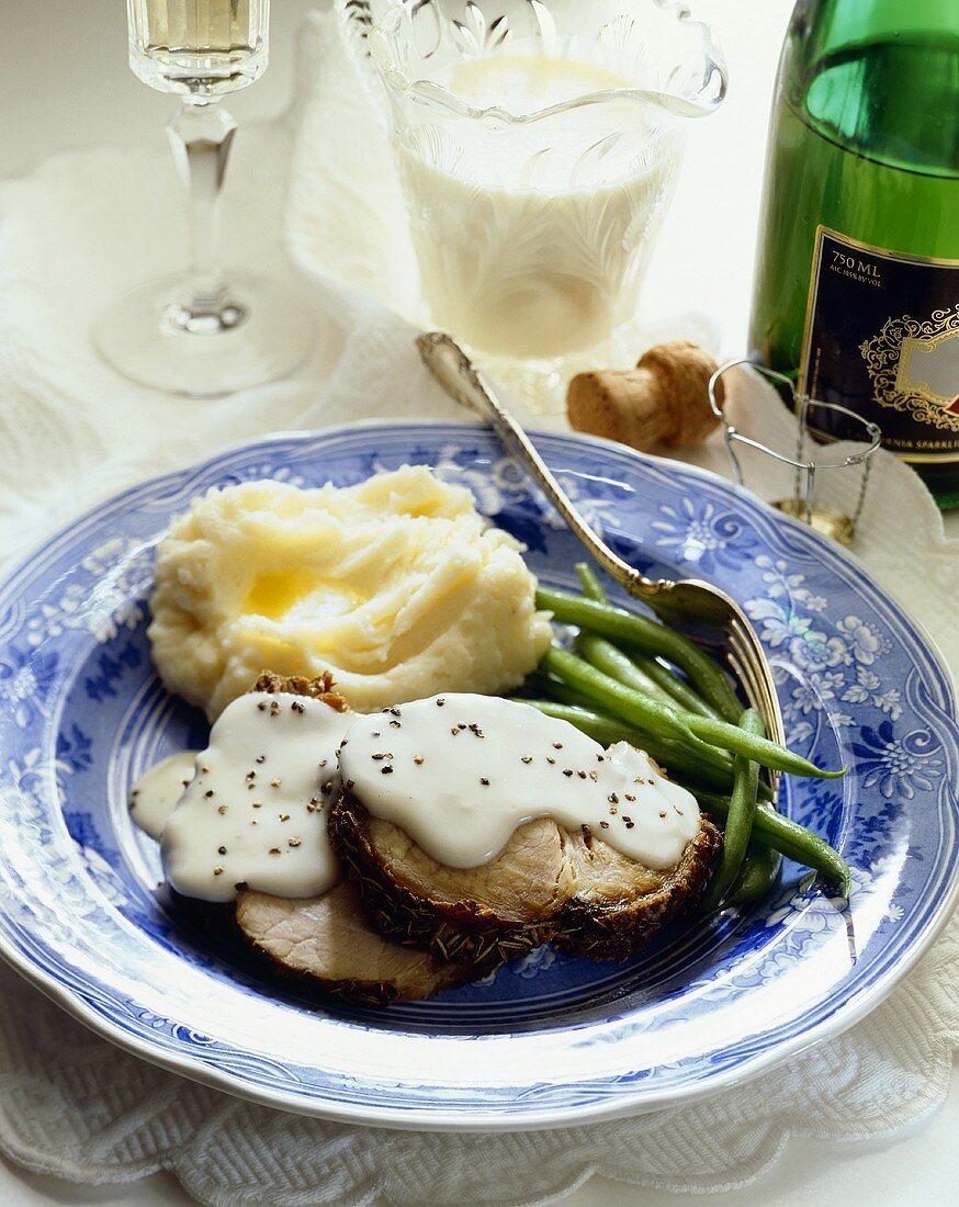Roast Pork Loin with Mashed Potatoes, Green Beans and Champagne