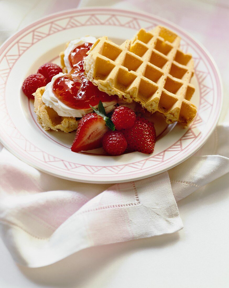 Heart shaped waffles with strawberries