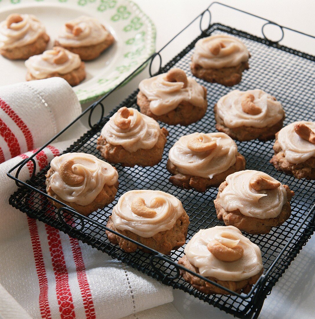 Frosted Cookies with Cashews on a Cooling Rack