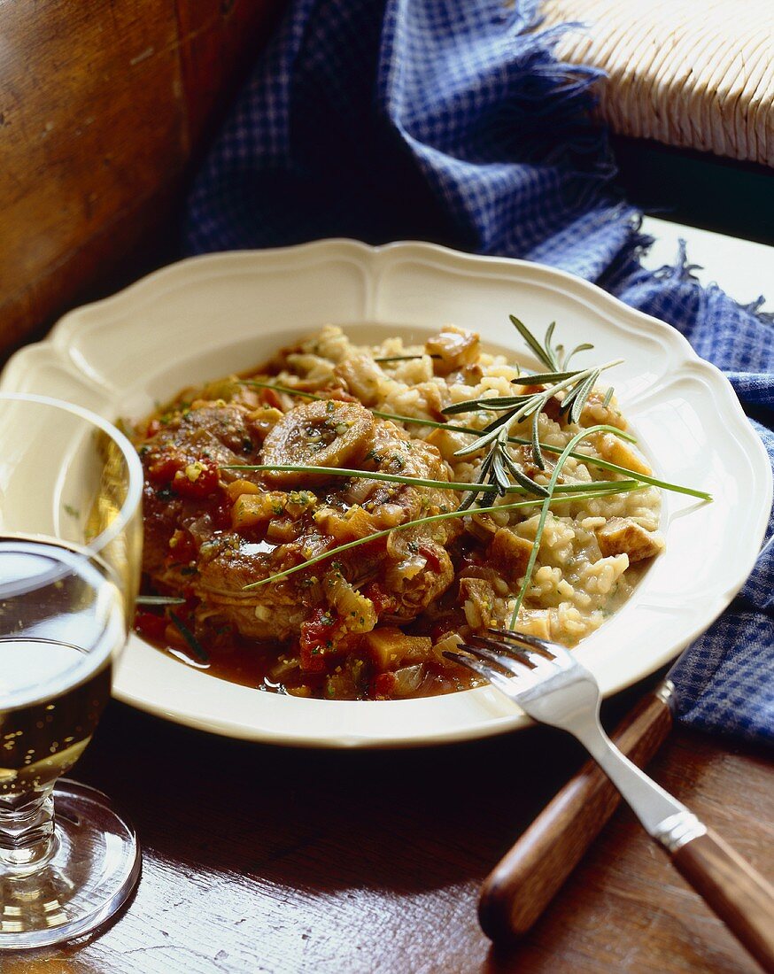 Osso buco e risotto (Braised slices of veal shank with risotto)