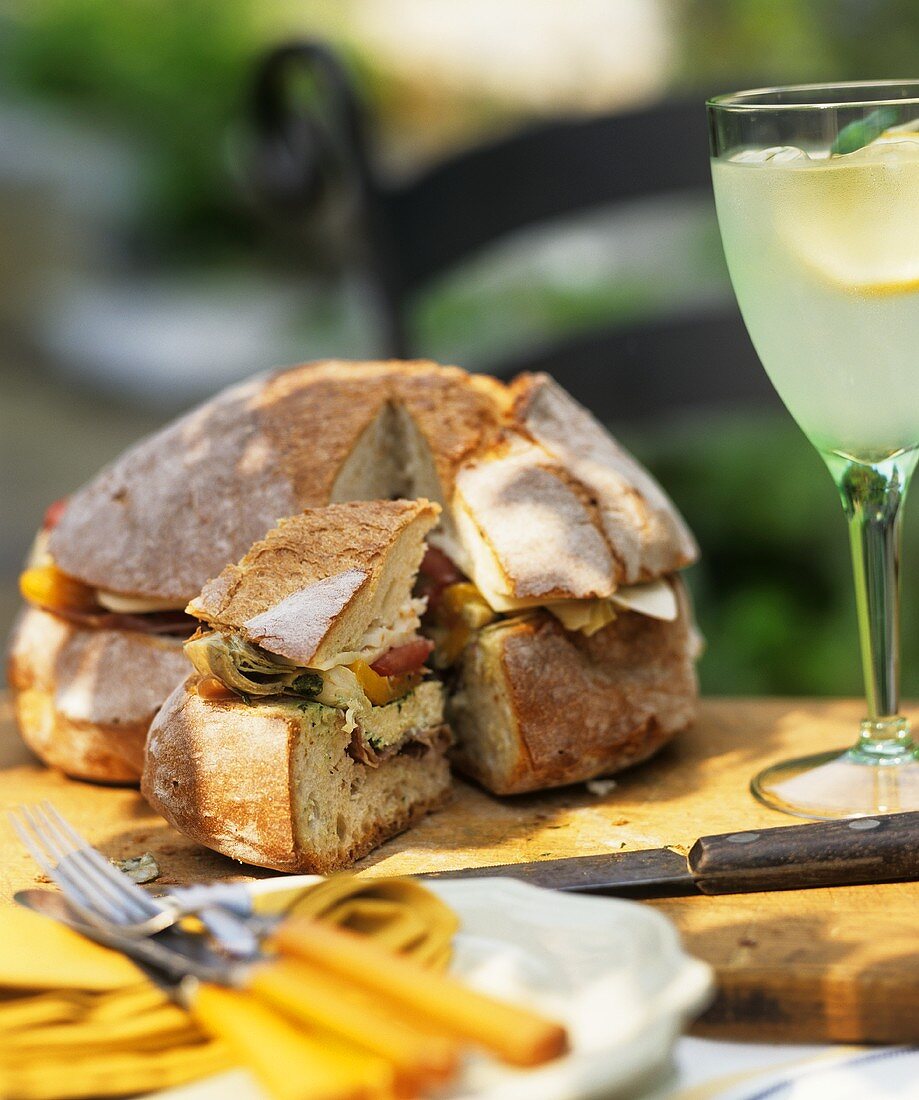 Sandwich on Artisan Bread; On Cutting Board; Outdoors
