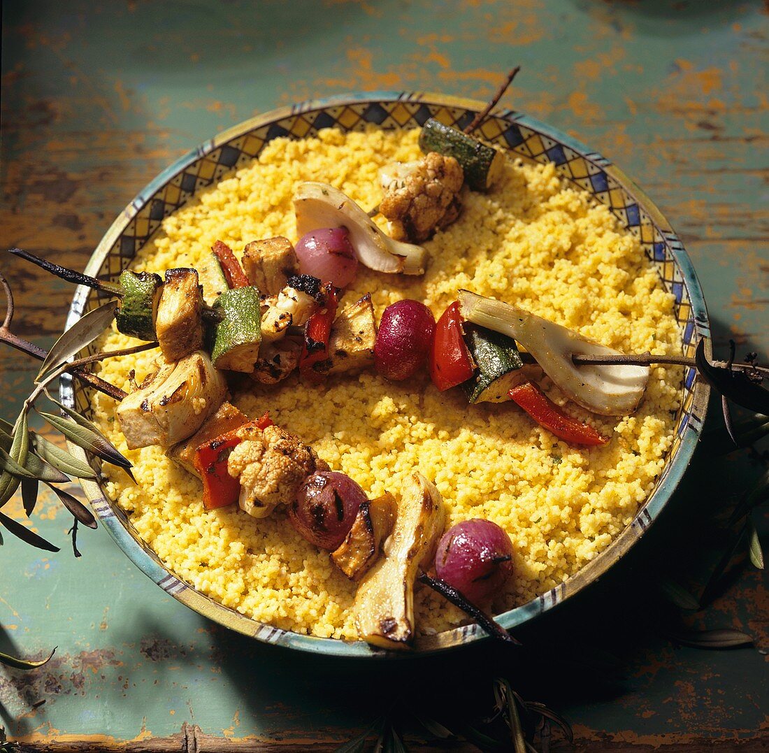 Grilled Vegetable Kabobs on a Large Bowl of Couscous