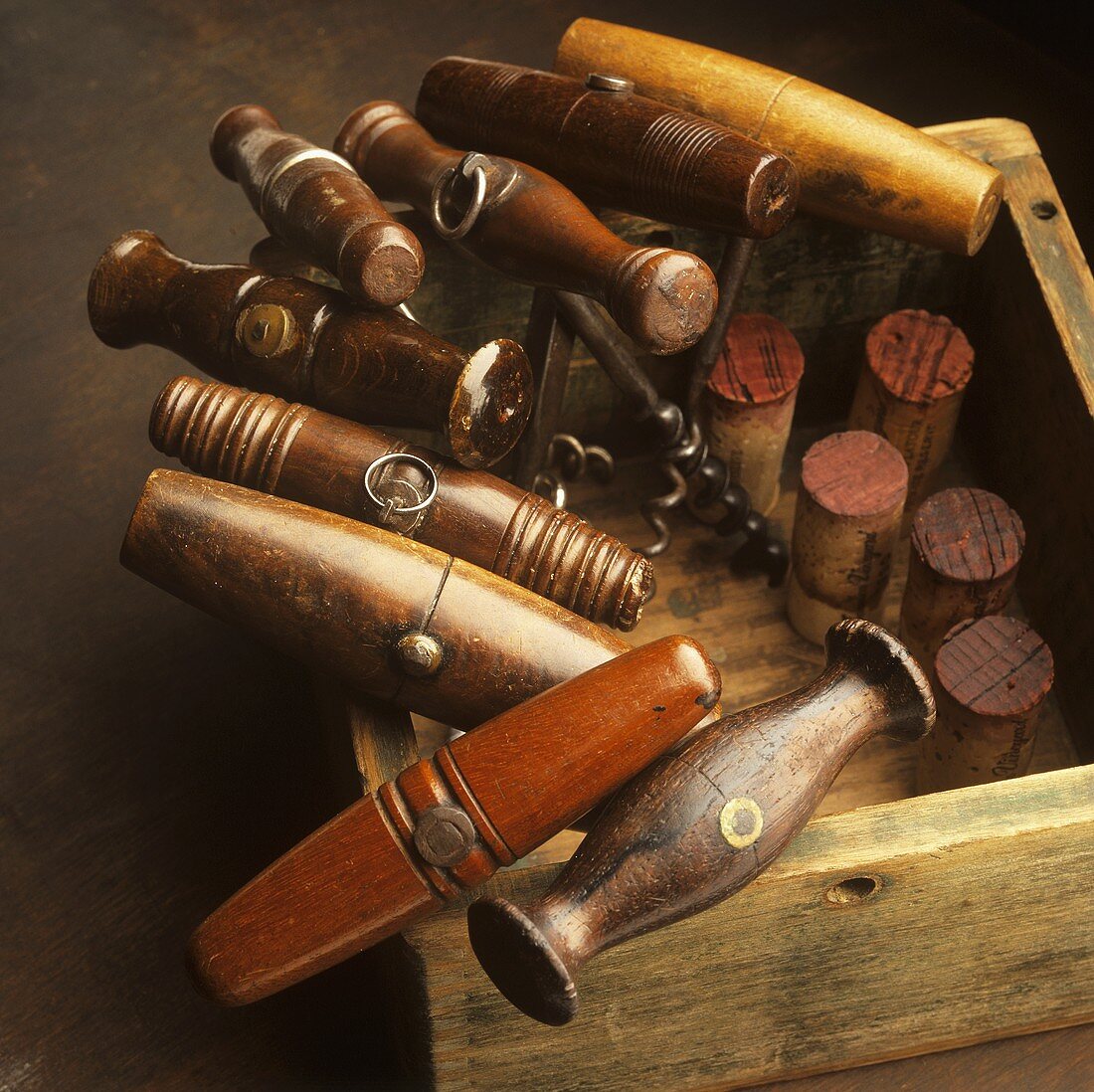 Antique Corkscrews with Corks in Wooden Box