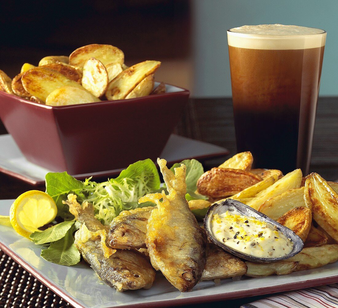 Fisch & Chips; dazu Guinness