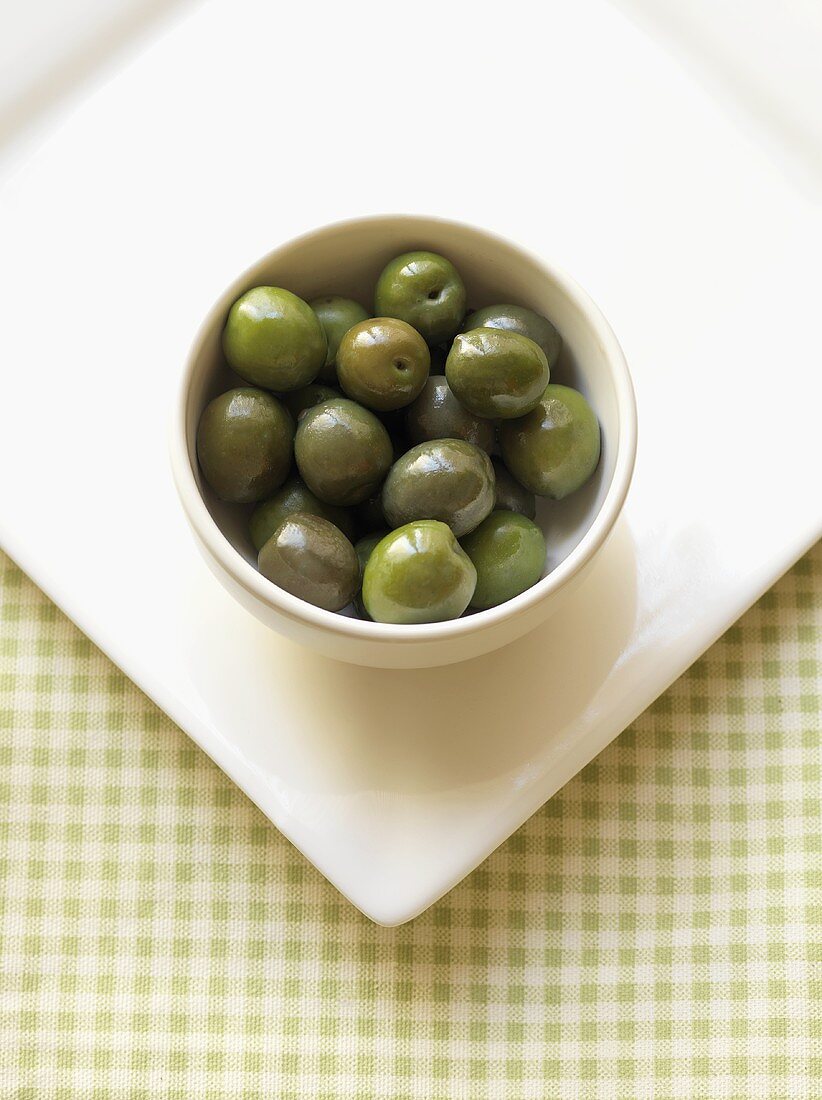 Whole Gourmet Olives in a White Bowl