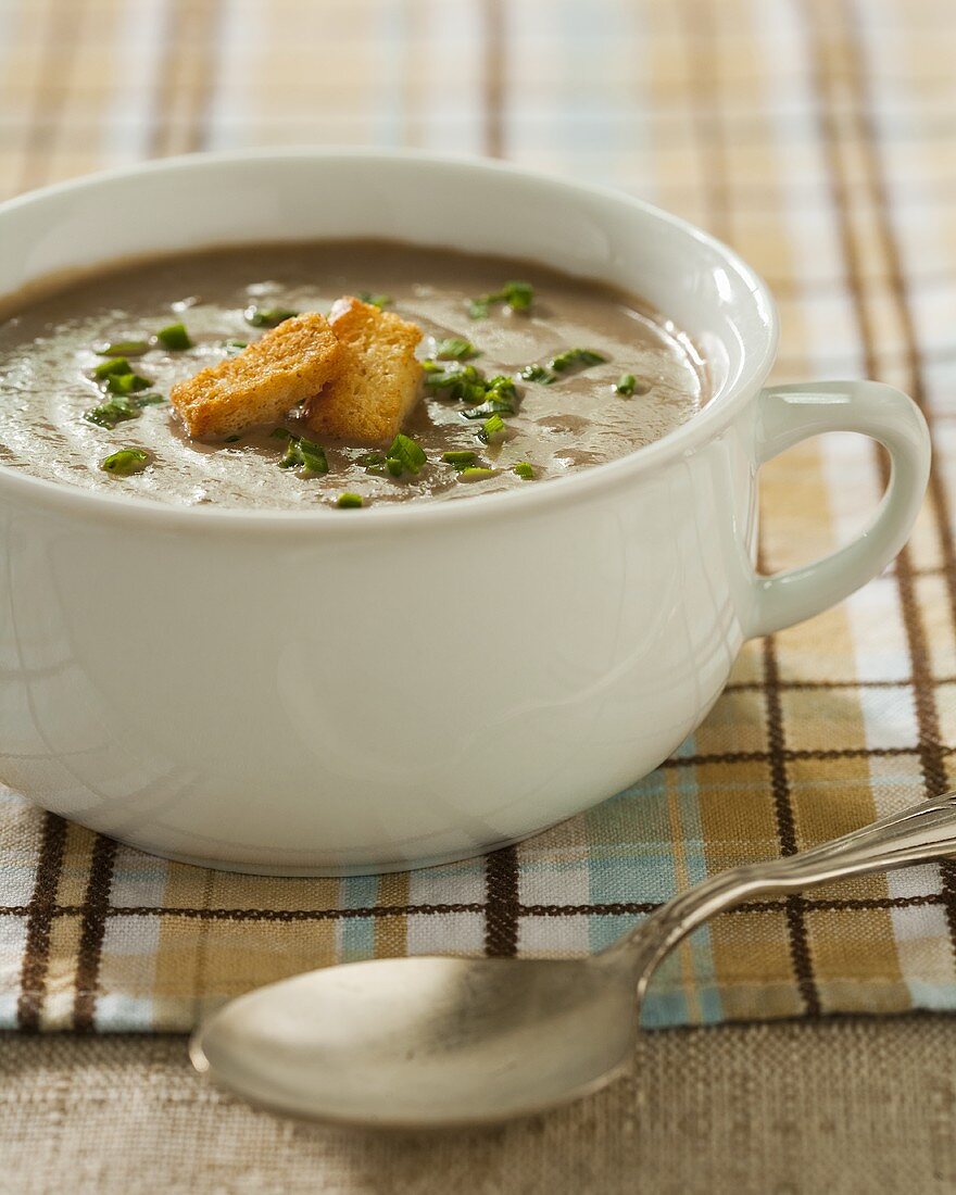 Bowl of Cream of Mushroom Soup with Croutons