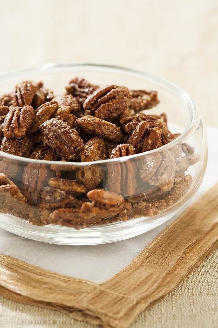 Spiced Candied Pecans in a Glass Bowl