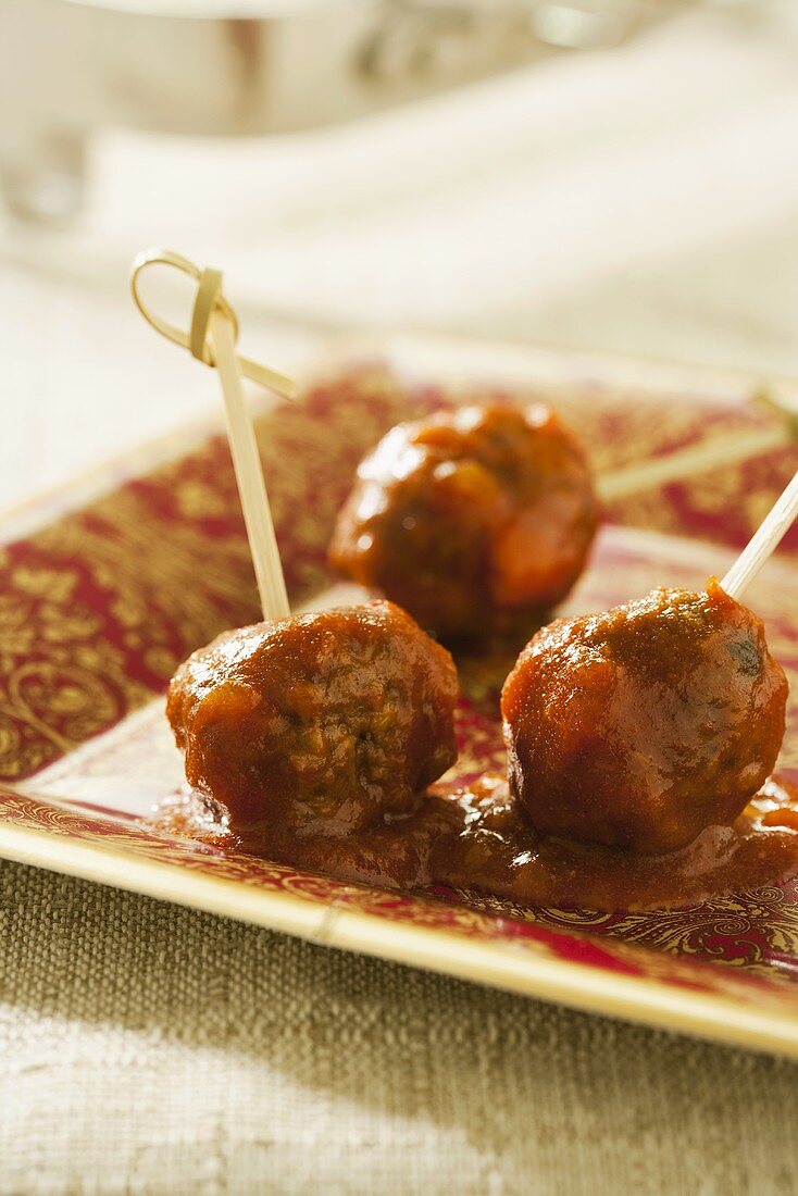 Hors d'oeuvre Sweet and Sour Meatballs with Toothpicks
