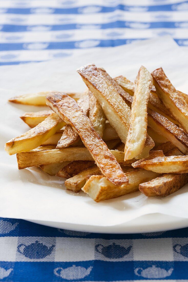 Oven Baked French Fries Piled on a Plate