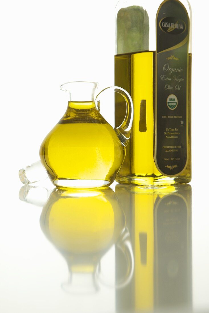 Bottle and Pitcher of Organic Cold Press Olive Oil
