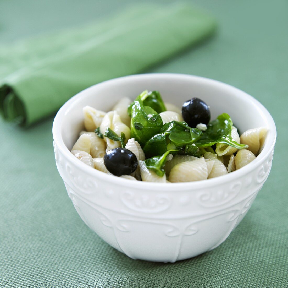 Bowl of Greek Pasta with Olives and Spinach