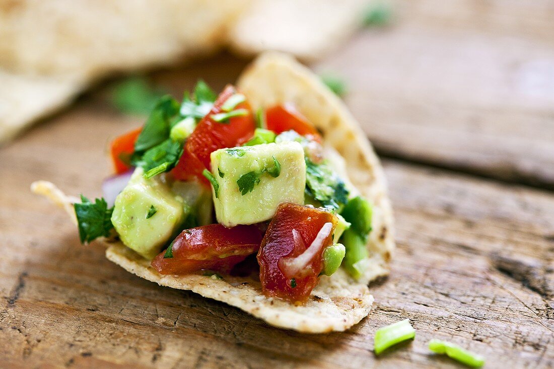 Tortilla Chip Topped with Avocado Salsa