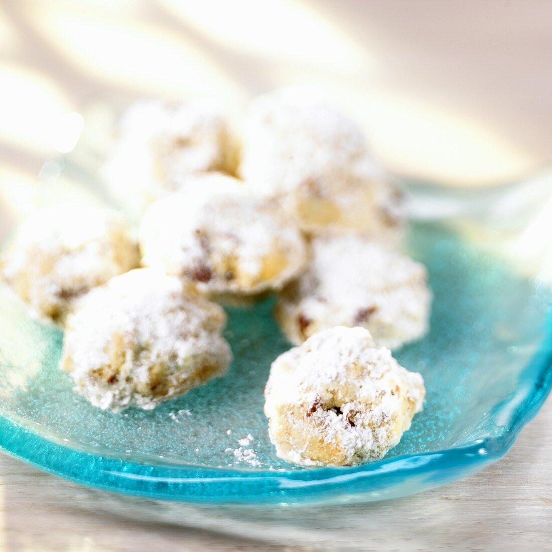 Mexican Wedding Cookies on a Blue Plate