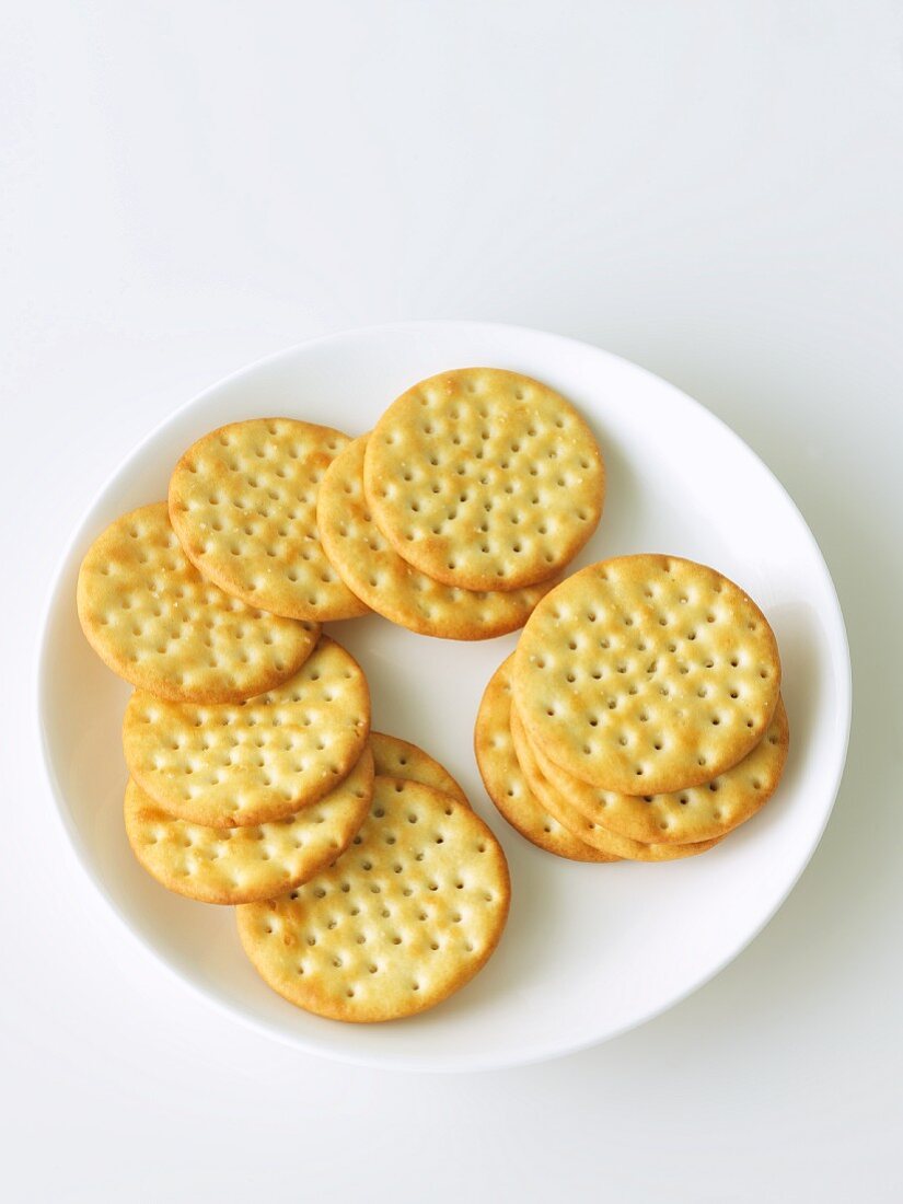 Plain Round Crackers on a White Plate