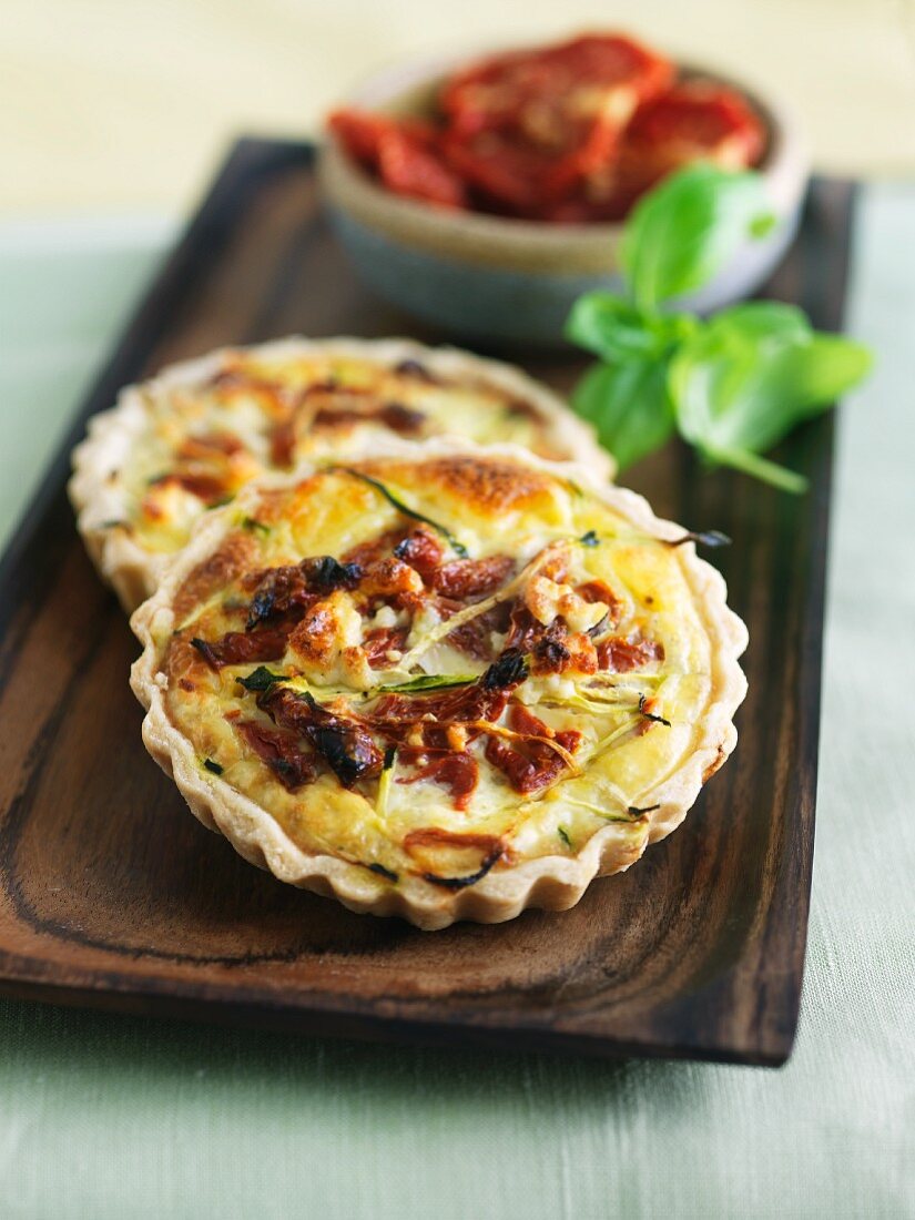 Sun Dried Tomato Quiches on Wooden Tray